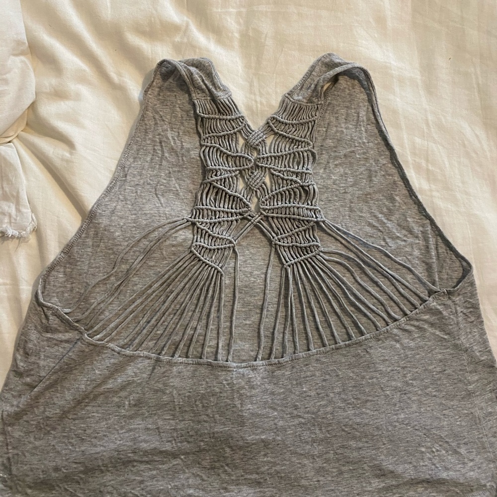 Free people tank with strap detail in back